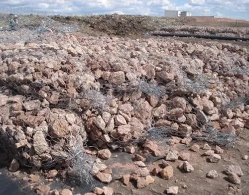 Filled sack gabions ready for placement